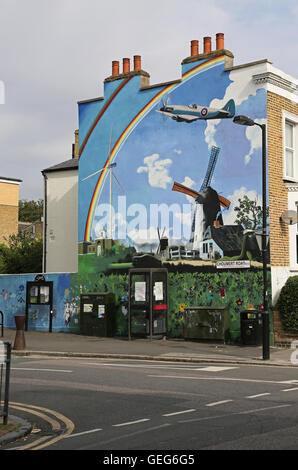 Murale à Peckham par Walter Kershaw. Une version moderne du « Paysage avec moulins à vent » de Jacob Ruisdael, qui fait partie du projet d'art local de la galerie Dulwich. Banque D'Images