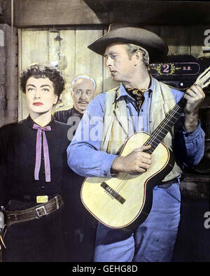 Joan Crawford, Sterling Hayden Johnny Guitar (Sterling Hayden) spielt Gitarre en dem frueheren senneur Saloon Geliebten Vienne (Joan Crawford). *** *** Légende locale 1953, Johnny Guitar, Wenn Frauen Hassen Banque D'Images