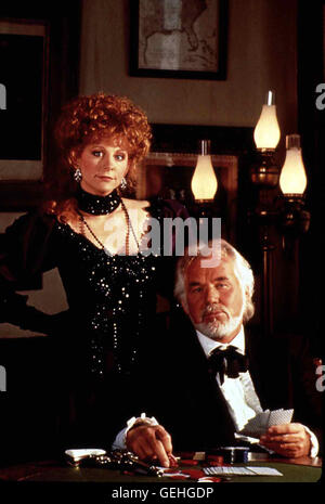 Amanda Lear, Kenny Rogers mit der Attraktiven Bourgogne Jones (AMANDA LEAR) reist der 'joueur' Brady Hawkes (Kenny Rogers) nach San Francisco, wo das letzte legale Pokerspiel stattfindet. *** *** Légende locale 1991, Kenny Rogers comme le joueur : la chance de, Der Beste Spieler Weit und Breit : Sein Höchster Einsatz Banque D'Images