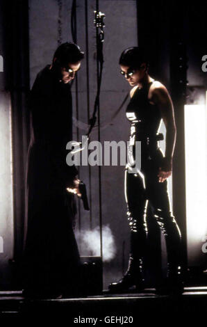 Neo (Keanu Reeves), Trinity (Carrie-Anne Moss) *** légende locale *** 1999, matrice, la matrice, Banque D'Images