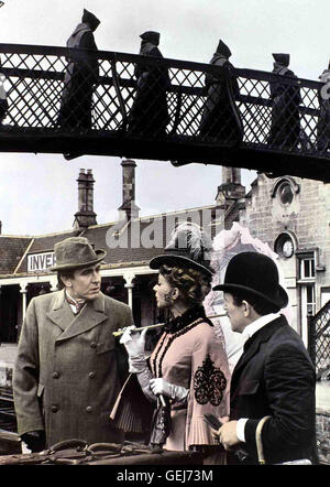 Robert Stephens, Geraldine Page, Colin Blakely und der kokainsuechtige vermutlich homosexuelle Sherlock Holmes (Robert Stephens, l) ist von verschiedenen Faellen voellig gelangweilt seinen. Dennoch kann nhi Le Dr Watson (Colin Blakely,r), Den Man ueberreden Banque D'Images