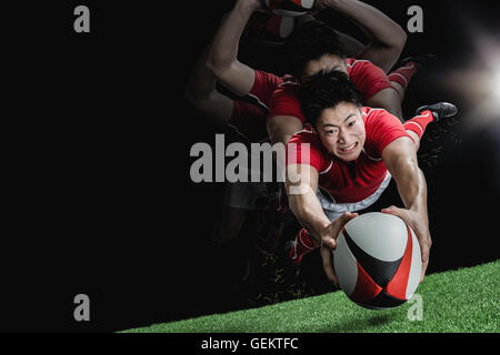 Portrait de joueur de rugby japonais pour marquer un essai de plongée Banque D'Images