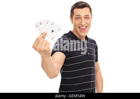 Lucky guy holding quatre as et regardant la caméra isolé sur fond blanc Banque D'Images