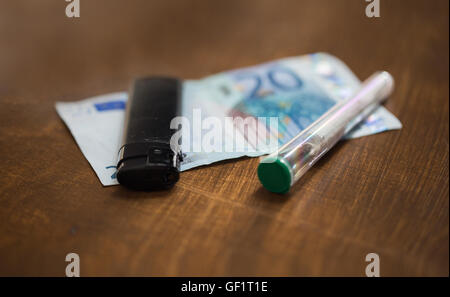 Close up de la marijuana et de l'argent commun Banque D'Images