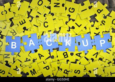 Pièces du puzzle avec word Backup Banque D'Images