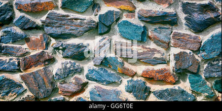 La texture sous la forme d'un mur de quartz coloré. Banque D'Images