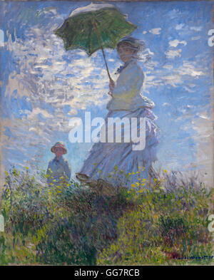 Femme avec un parasol Madame Monet et son fils de Claude Monet Banque D'Images