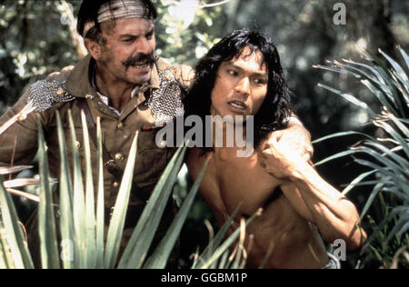 DAS DSCHUNGELBUCH / Jungle Book USA 1994 / Stephen Sommers der von Wölfen Mowgli (aufgezogene JASON SCOTT LEE) ist erwachsen geworden. Eines Tages trifft er Kitty wieder, die er schon als genre kennen gelernt hat. Mit ihrer Hilfe lernt er die Sprache der Menschen und kehrt zurück in die Zivisilation. Der englische Offizier Boone se mit Hilfe Mowglis an einen Schatz kommen, der in einer versunkenen Dschungelstadt liegen soll... Foto : le colonel Brydon (Sam Neill) Régie : Stephen Sommers aka. Le Livre de la jungle Banque D'Images