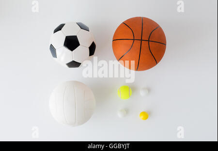 Close up of sports balls set over white Banque D'Images