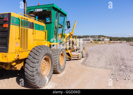 Niveleuse machine industrielle véhicule sur la construction de routes landscape Banque D'Images