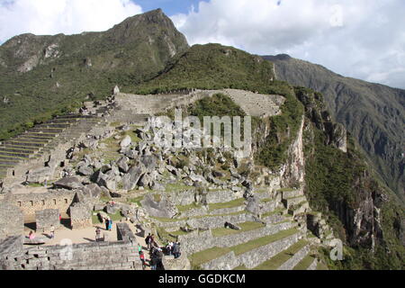 Machu Picchu dans l'après-midi. Citadelle Inca situé en altitude, dans la cordillère des Andes, au Pérou. Banque D'Images
