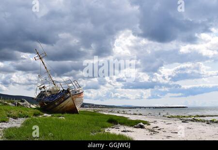 Bateau naufragé, péninsule de Kintyre, Ecosse Banque D'Images