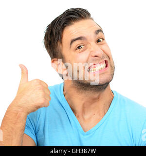 Portrait de avec expression drole holding Thumbs up against white background Banque D'Images