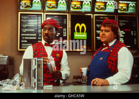 DER PRINZ AUS ZAMUNDA venant d'Amérique du Nord Etats-Unis 1988 John Landis Prince Akeem (Eddie Murphy), Patrice McDowell (LOUIE ANDERSON), dans une scène d'un restaurant Mcdonald's, Regie : John Landis aka. En provenance du nord Banque D'Images