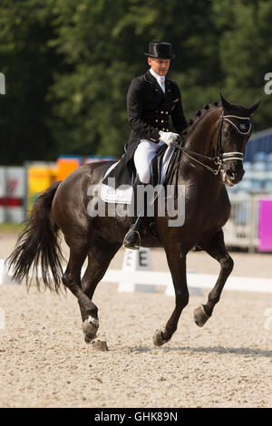 Edward Gal avec son cheval la voix de Glock au Championnat de dressage. Edward Gal a remporté le championnat. Banque D'Images