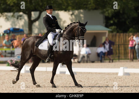 Edward Gal avec son cheval la voix de Glock au Championnat de dressage. Edward Gal a remporté le championnat. Banque D'Images