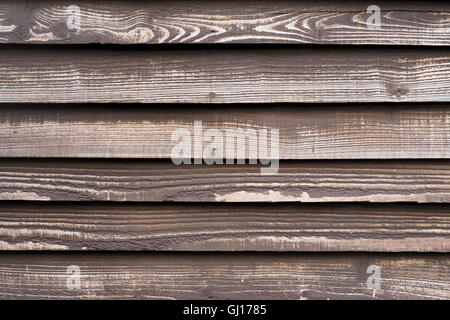 Un mur lambrissé de bois en couches extérieures Banque D'Images