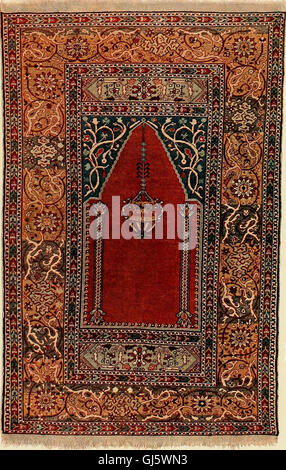 Ce travail de 1910 donne un aperçu des tapis, coureurs et tapis orientaux, en se concentrant sur leur design, leur savoir-faire et leur importance culturelle. Il couvre également quelques reproductions Jacquard, détaillant les techniques de tissage et les motifs complexes qui définissent ces textiles. La publication sert de référence pour les collectionneurs, les historiens et les passionnés d'art textile Banque D'Images