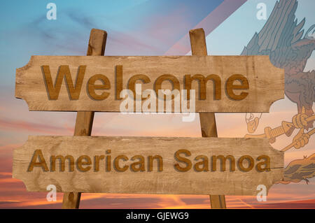 Bienvenue à Samoa Américaines chanter sur fond de mélange de bois avec drapeau national Banque D'Images