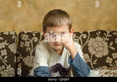 Portrait of a Boy with hand on face Banque D'Images