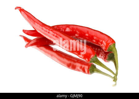 Deux red hot peppers sur un miroir Banque D'Images