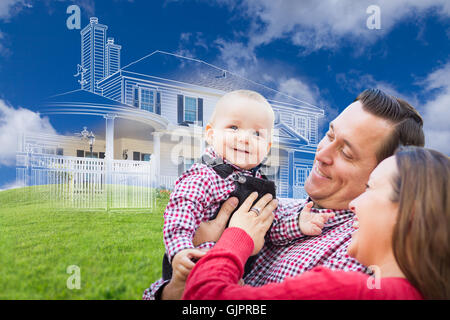 Heureux jeune famille avec maison fantôme, dessin Photo partielle et Rolling Green Hills derrière. Banque D'Images