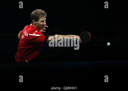 Rio de Janeiro, Brésil. Août 17, 2016. L'Allemagne Bastian Steger fait concurrence au cours de l'équipe masculine pour la médaille de bronze de Tennis de table à l'encontre de la Corée du Sud aux Jeux Olympiques de Rio 2016 à Rio de Janeiro, Brésil, le 17 août 2016. L'Allemagne a remporté la médaille de bronze. © Shen Bohan/Xinhua/Alamy Live News Banque D'Images