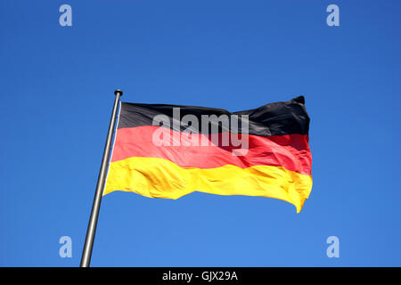 D'un drapeau allemand Allemagne-vole un drapeau Banque D'Images