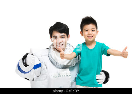 Studio shot astronautes et le petit garçon Banque D'Images