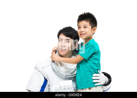 Studio shot astronautes et le petit garçon Banque D'Images