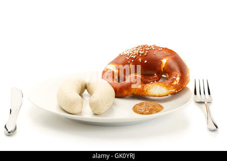 Saucisses de veau à la moutarde de bretzel sur la plaque Banque D'Images