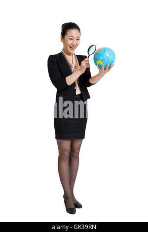 Mme studio shot Business et les globes Banque D'Images