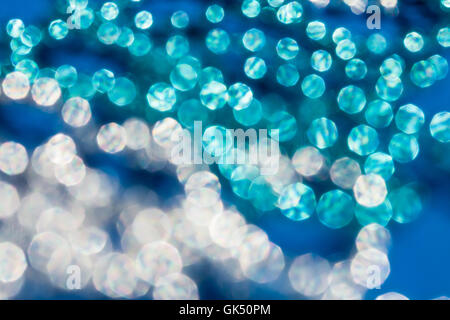 Abstract twinkled bleu lumineux, avec en arrière-plan flou artistique flou Banque D'Images