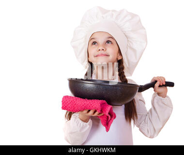 La cuisine et les gens concept - smiling little girl dans cook hat avec poêle Banque D'Images