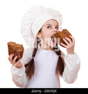 La cuisine et les gens concept - smiling little girl dans cook hat, isolé sur fond blanc Banque D'Images