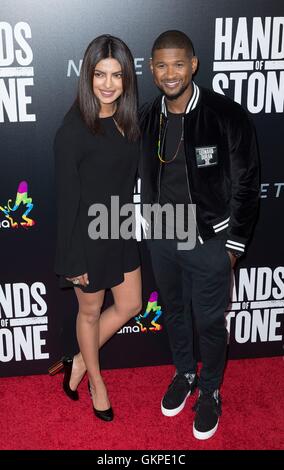 New York, NY, USA. Août 22, 2016. Pryanka Chopra, Usher Raymond IV au niveau des arrivées pour LES MAINS DE PIERRE Premiere, la School of Visual Arts (SVA) Theatre, New York, NY, le 22 août 2016. Crédit : Lev Radin/Everett Collection/Alamy Live News Banque D'Images