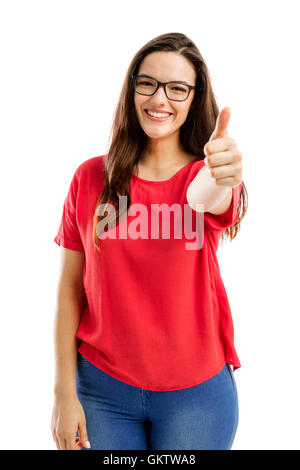 Belle femme et confiante avec Thumbs up, isolé sur fond blanc Banque D'Images