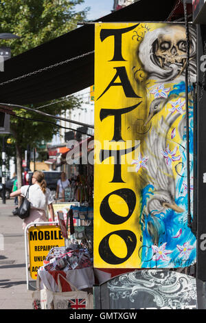 Tattoo shop sign at Camden Lock Market, Camden, London, United Kingdom Banque D'Images