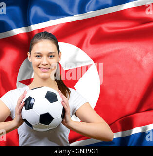 Fière femme amateur de football de la Corée du Nord Banque D'Images