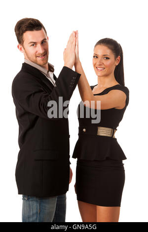 Business couple fêter la réussite, applaudir avec les mains. Le travail de l'équipe image conceptuelle. Banque D'Images