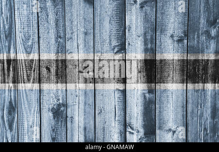 Drapeau sur Weathered Wood Banque D'Images
