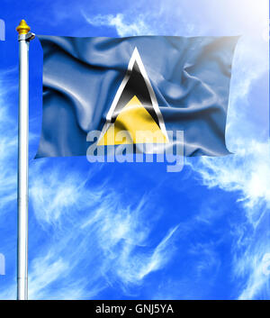 Le ciel bleu et le mât avec pendu waving flag de Sainte-Lucie Banque D'Images