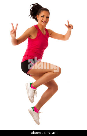 Femme active faisant de l'aérobic pour une danse cardio training Banque D'Images