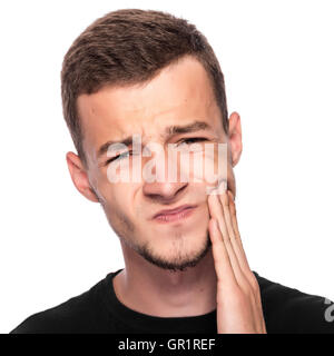 Mal de dents. Portrait d'un homme au visage fermé à la main. sur fond blanc. Banque D'Images