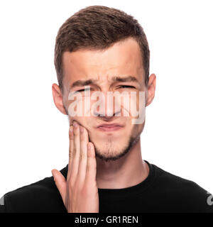 Mal de dents. Portrait d'un homme au visage fermé à la main. sur fond blanc. Banque D'Images