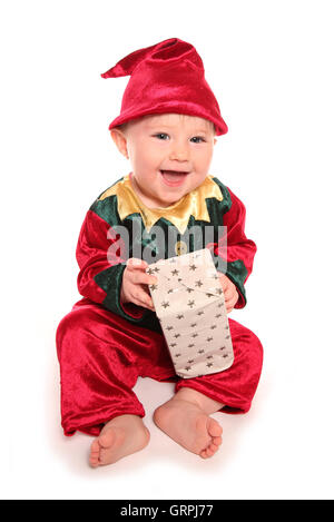 Enfant habillé en elfs santas little helper Fancy Dress Costumes, décoration Banque D'Images