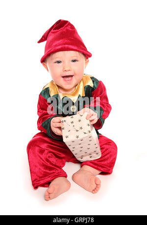 Enfant habillé en elfs santas little helper Fancy Dress Costumes, décoration Banque D'Images