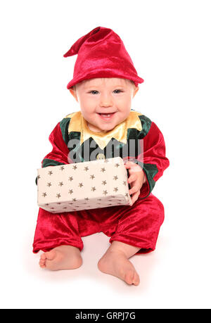 Enfant habillé en elfs santas little helper Fancy Dress Costumes, décoration Banque D'Images