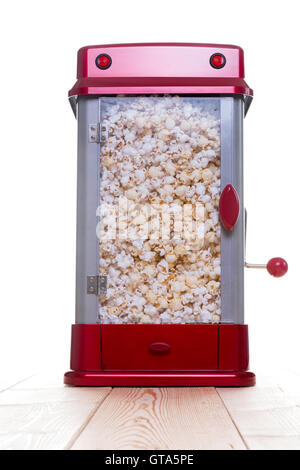 Levier manivelle qui sort du côté de popcorn maker complet avec la couleur rouge et gris en haut et en bas. Comprend les poignée de porte. Banque D'Images