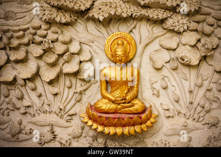 Traditional Thai style art sculpture sur le mur du temple Banque D'Images